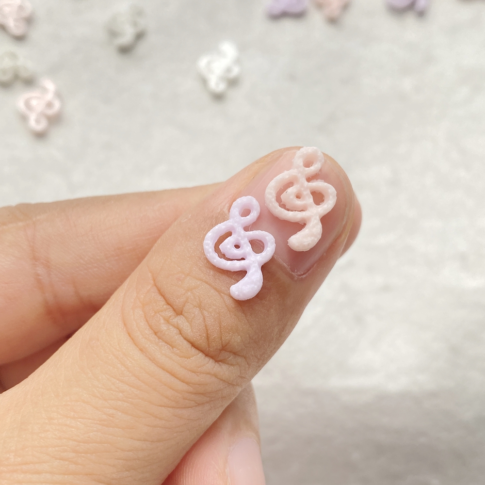 เรซิ่นผสมลายสัญลักษณ์ดนตรีสีชม - Musical Instrument Symbols บทวิจารณ์และราคา